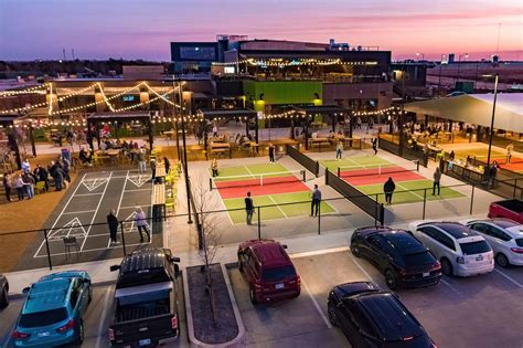 Chicken n pickle okc - Enjoy rotisserie chicken, pickleball, ping-pong, and yard games at Chicken N Pickle, located between Oklahoma City and Edmond. The Half rooftop bar and …